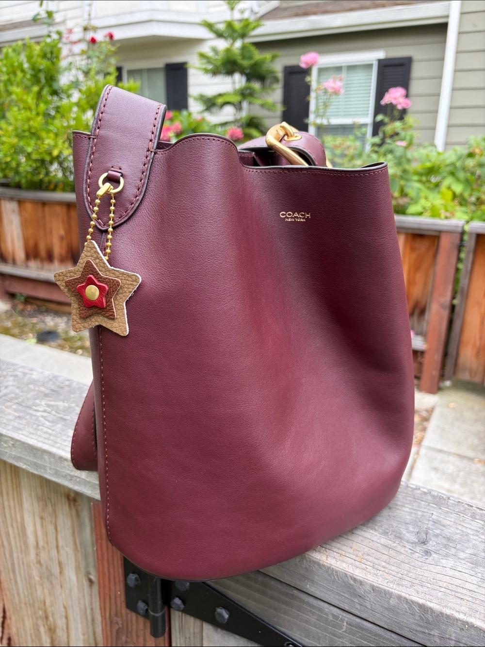 Coach Burgundy Bleeker Bucket Bag with Star Charm